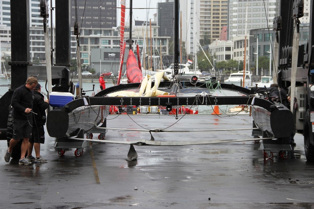 Emirates Team NZ’s first  SL-33 sits in the travelift slings at the team’s base in the Viaduct harbour © Richard Gladwell www.photosport.co.nz